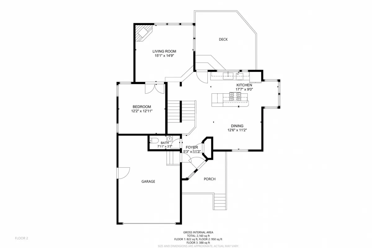 This image captures the essence of the open-concept main living space, showcasing the seamless flow between the living room, kitchen, dining area, and deck. Large windows flood the space with natural light and offer expansive views beyond, while comfortable, stylish furnishings invite relaxation and gathering.